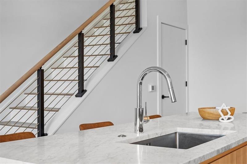 112 Burrows Street Pittsburgh, PA 15213 - Photo 9 of 13 a kitchen with a sink a refrigerator and with a stove