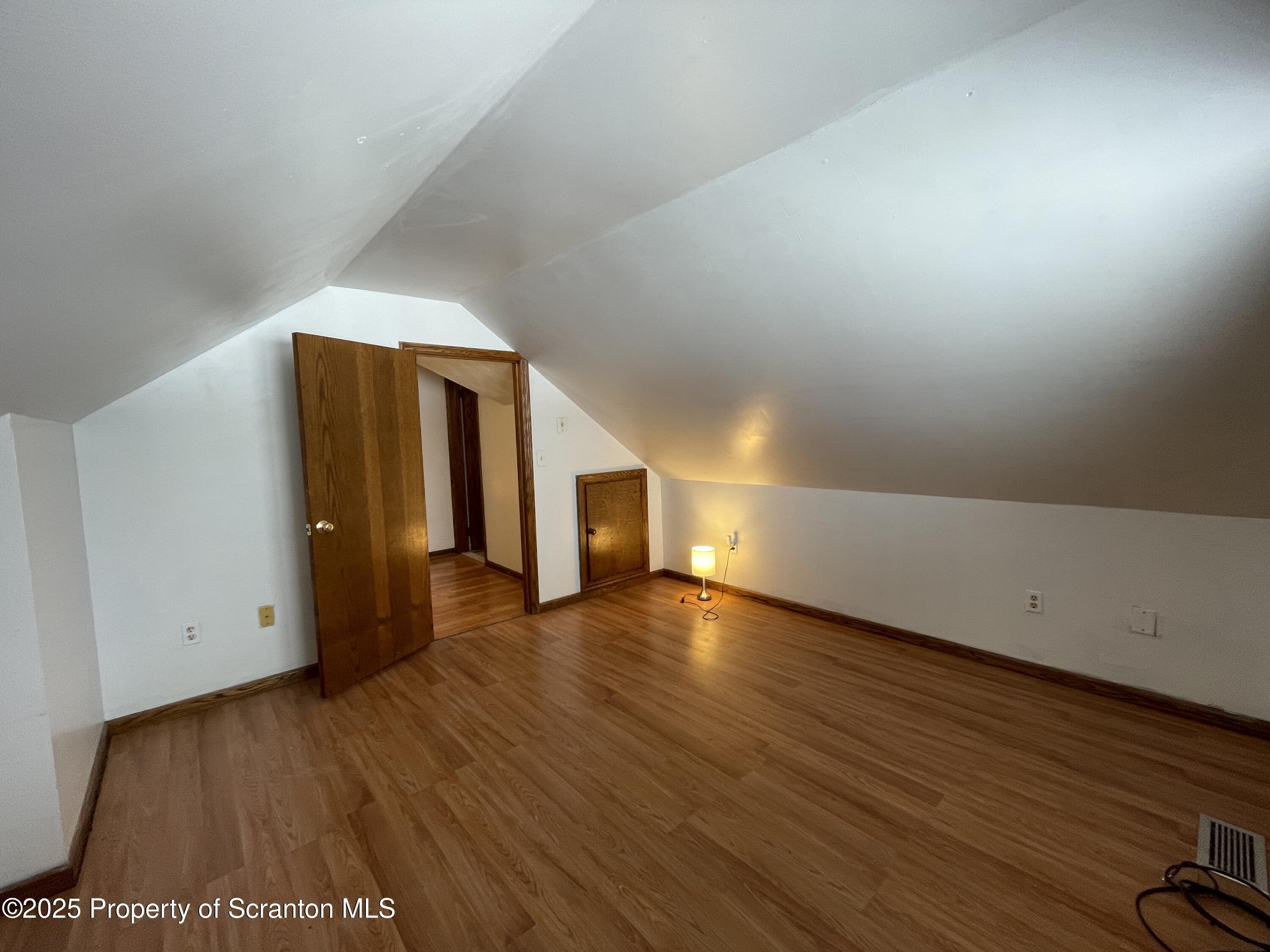 2 Lord Avenue Simpson, PA 18407 - Photo 24 of 62 a view of a livingroom with wooden floor