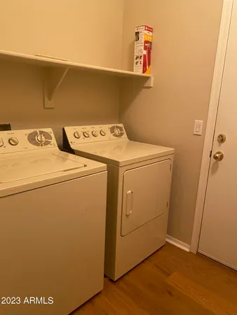 a utility room with dryer and washer