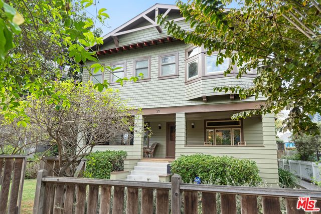 a front view of a house with a porch