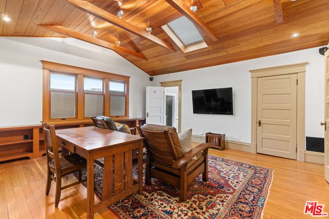 a dining room with a table and chairs