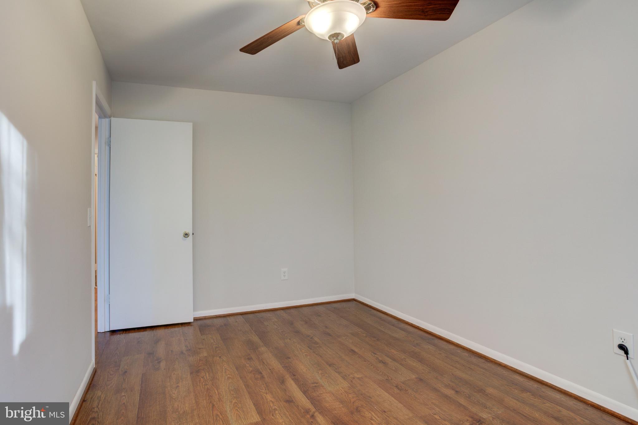 11908 Barrel Cooper Court Reston, VA 20191 - Photo 32 of 40 Bright and airy room with modern ceiling fan.