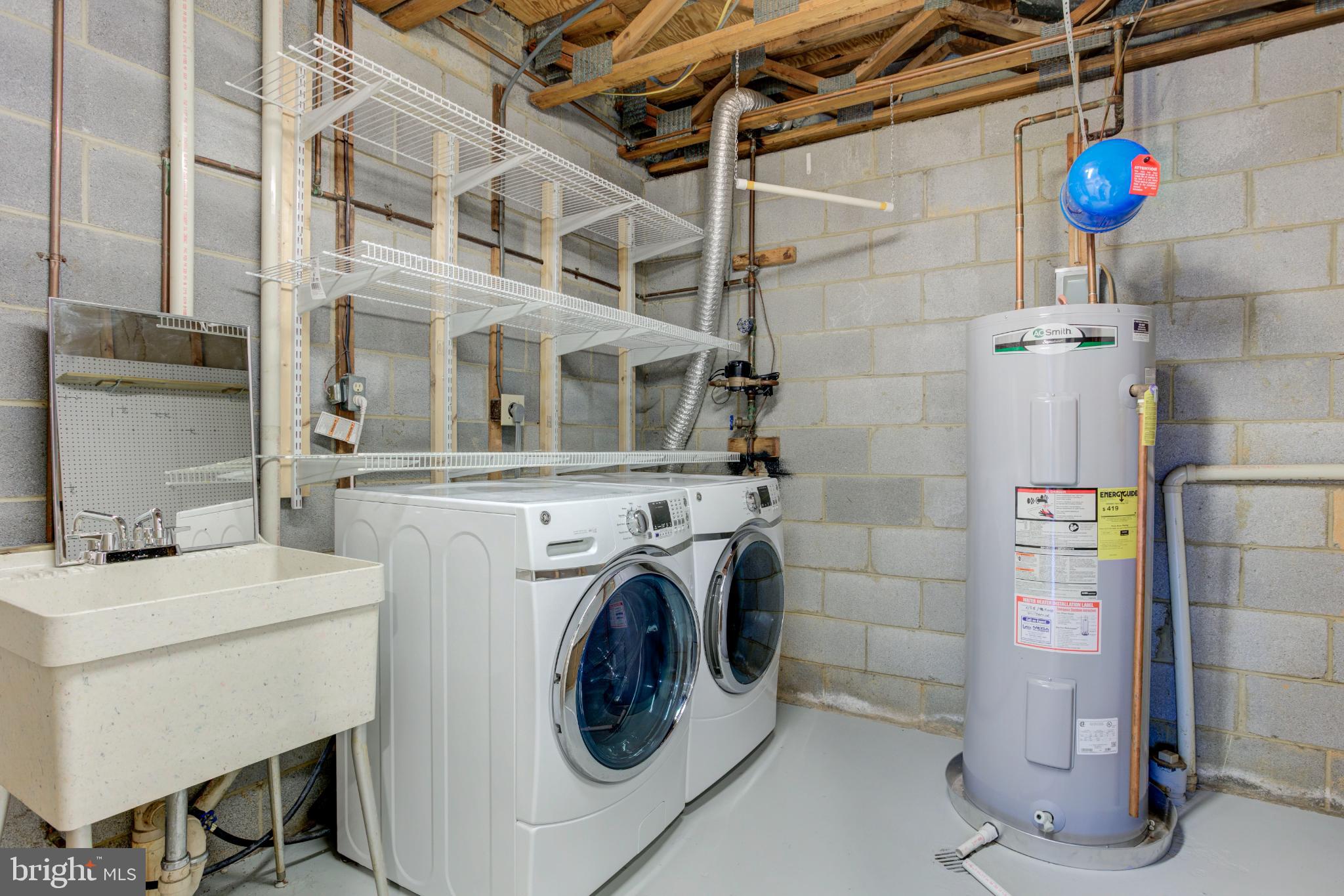 11908 Barrel Cooper Court Reston, VA 20191 - Photo 35 of 40 Functional laundry space with modern appliances.
