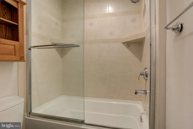 a backyard of a house with lots of trees