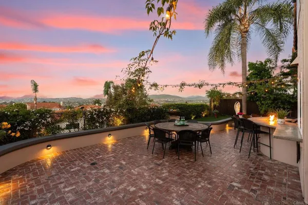 a view of a terrace with sitting area