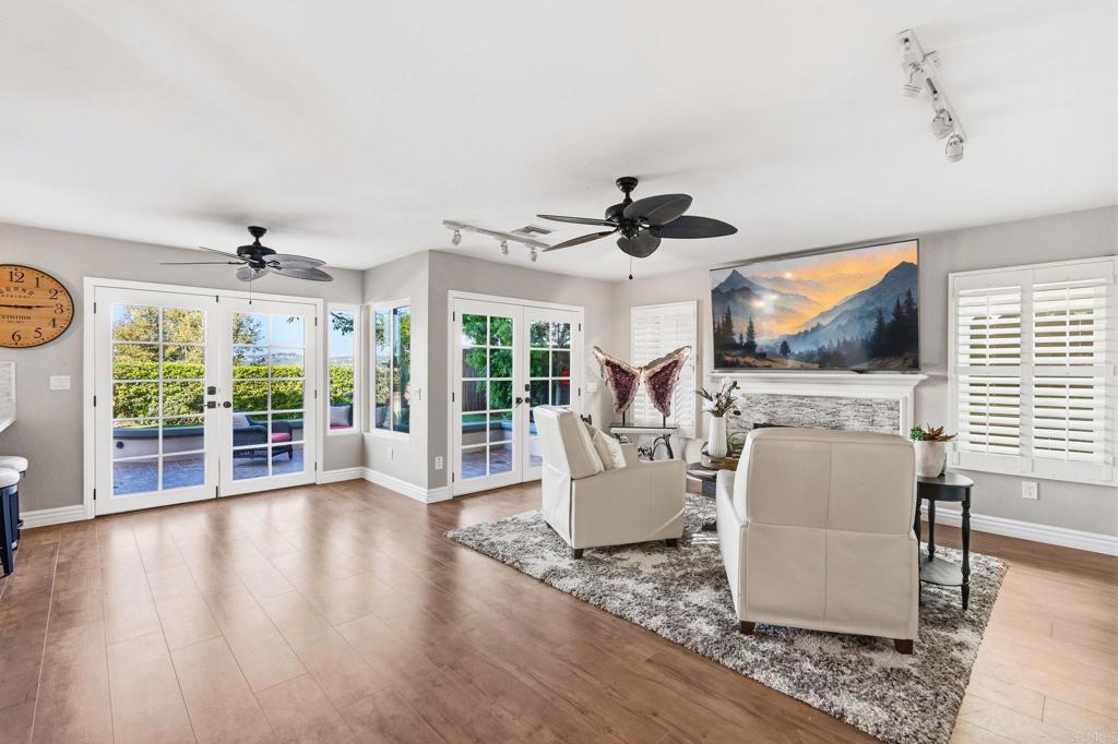 1842 Avenida Mimosa Encinitas, CA 92024 - Photo 13 of 38 a living room with furniture and a flat screen tv