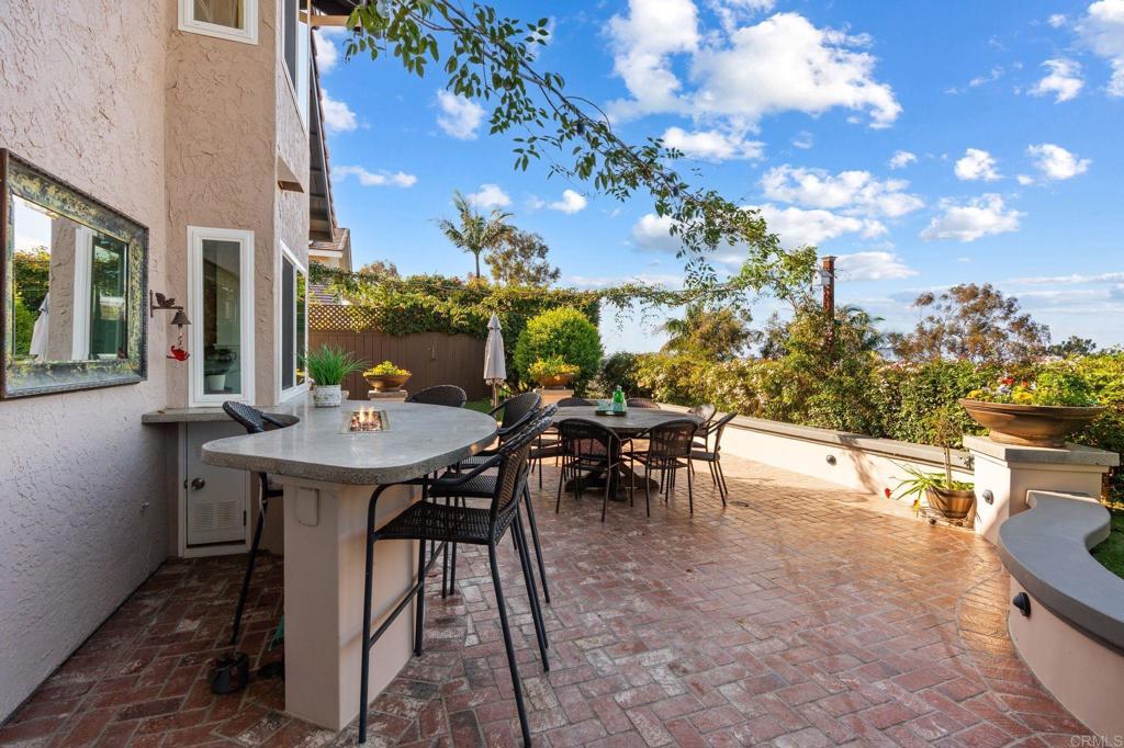 1842 Avenida Mimosa Encinitas, CA 92024 - Photo 2 of 38 a view of a patio with a table and chairs