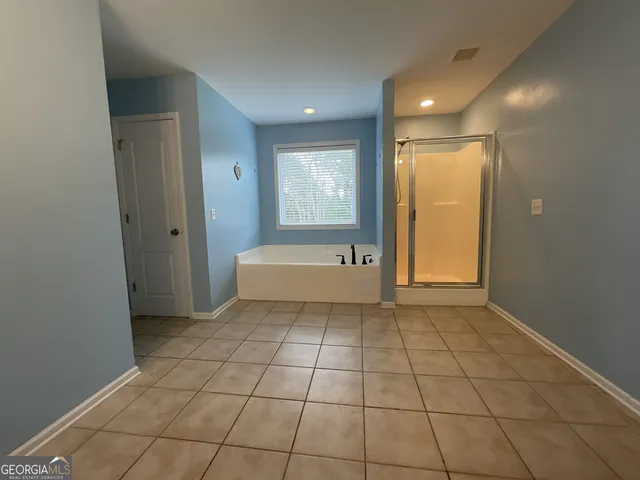 a view of a livingroom with a furniture