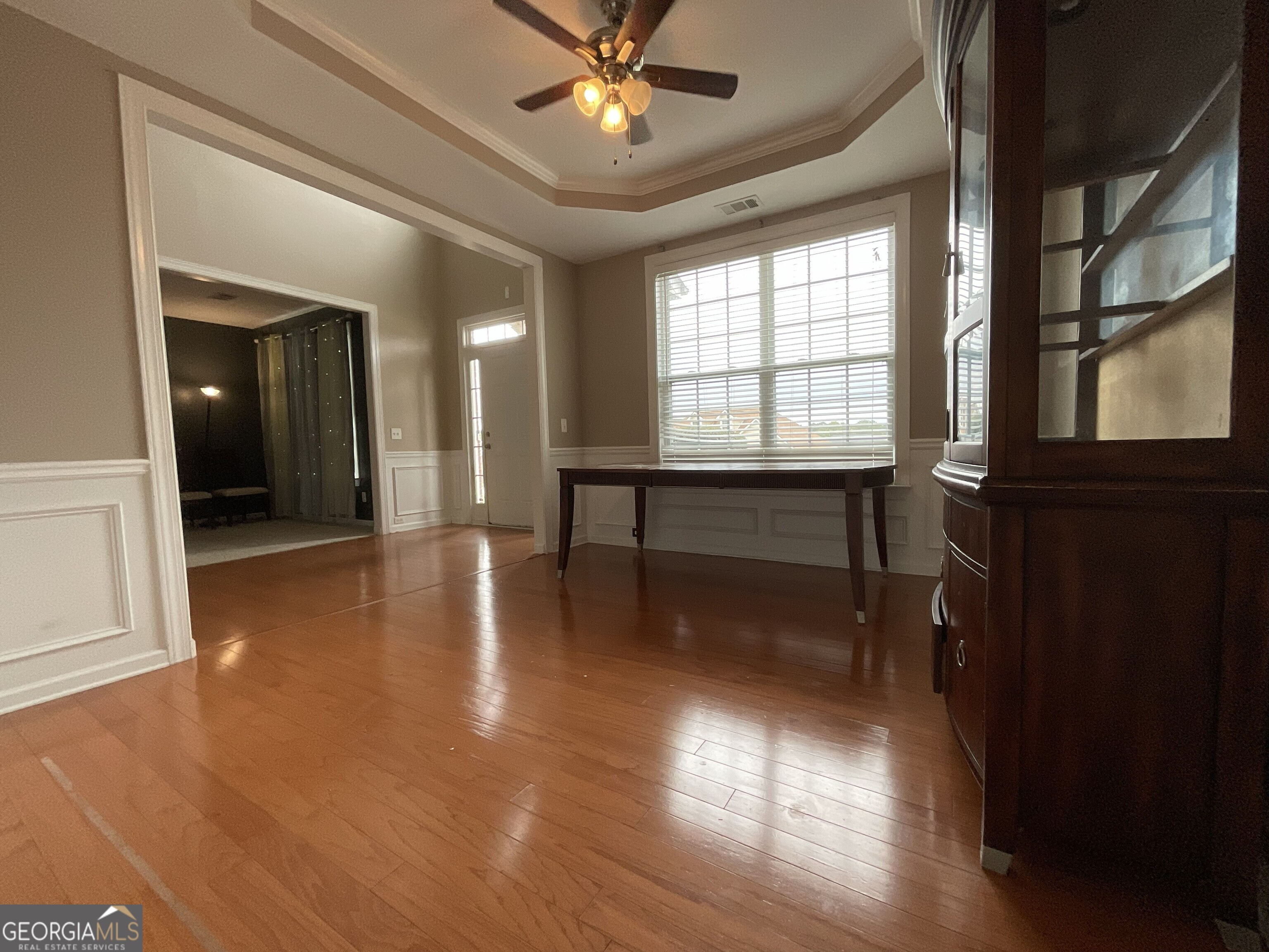 302 Brampton Way Perry, GA 31069 - Photo 6 of 39 wooden floor in a hall with a window and a livingroom
