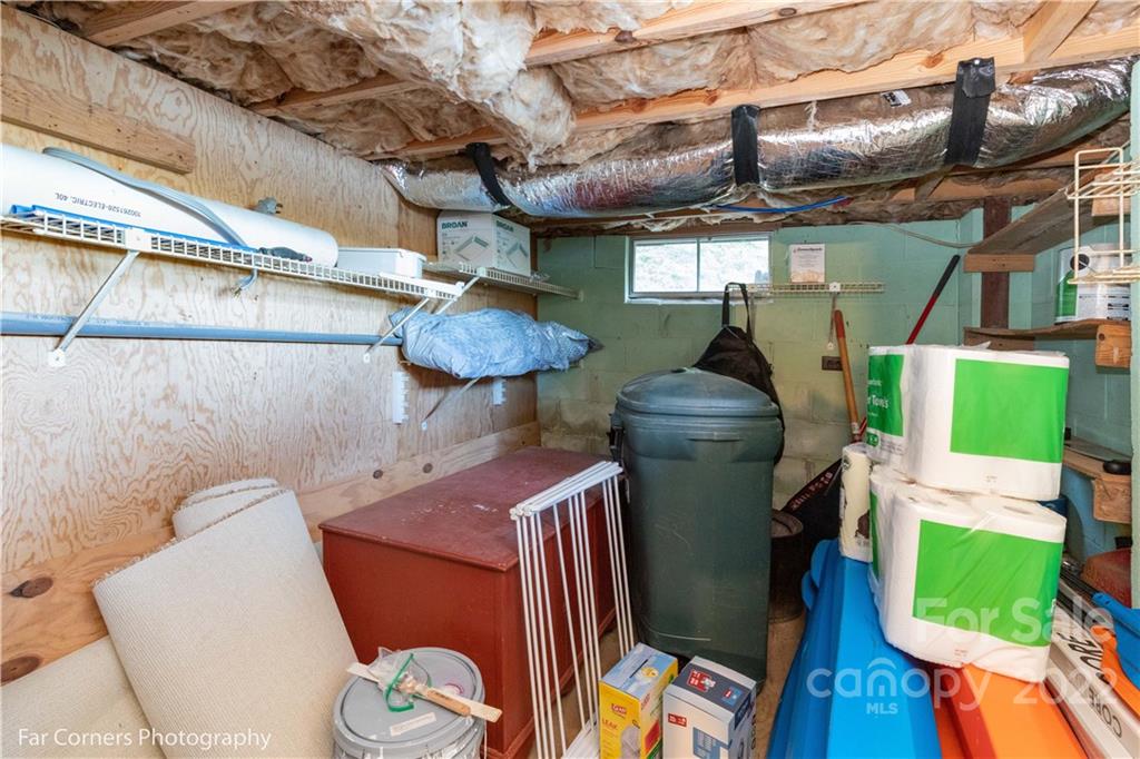 588 Thunderbird Trail Robbinsville, NC 28771 - Photo 18 of 20 a bathroom with a sink and a mirror
