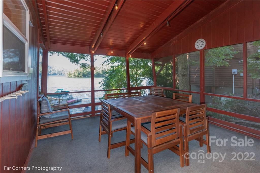 588 Thunderbird Trail Robbinsville, NC 28771 - Photo 5 of 20 a table and chairs with the view of outdoor space