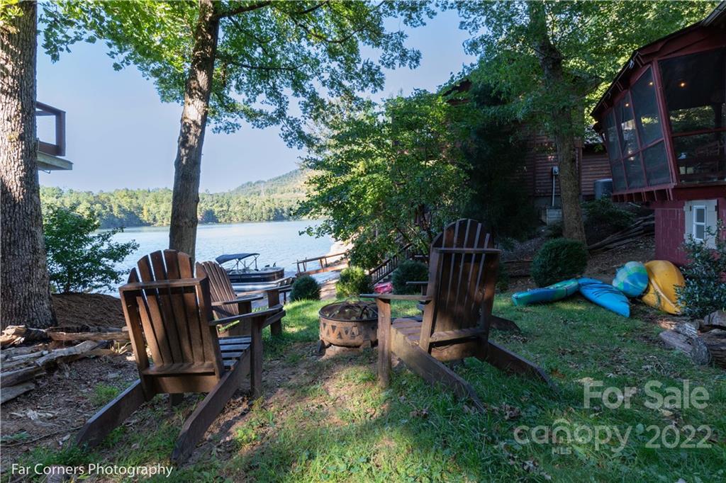 588 Thunderbird Trail Robbinsville, NC 28771 - Photo 7 of 20 a view of a chairs and table in the patio