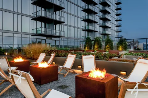 a view of a balcony with a patio