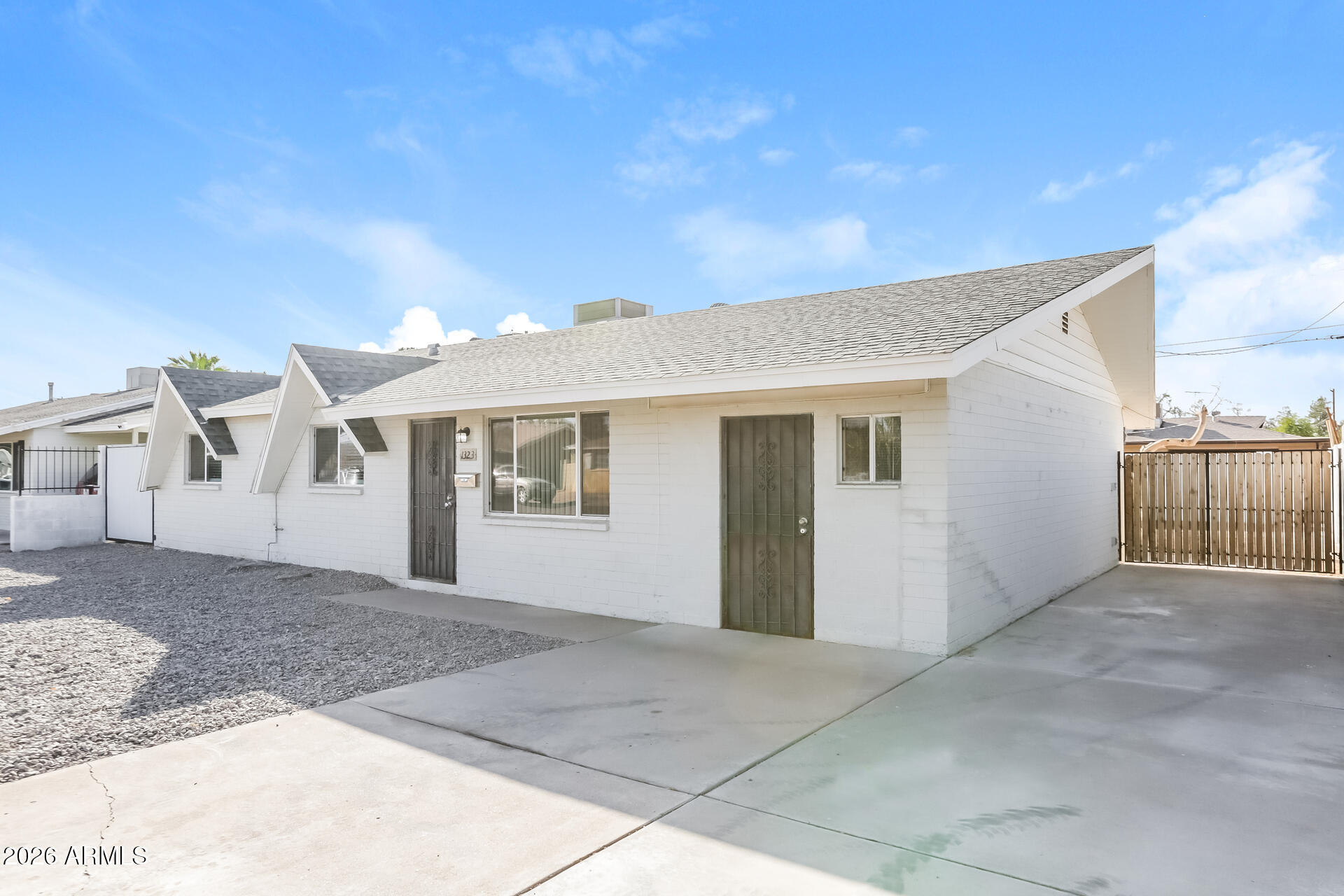 1323 West Romo Jones Street Tempe, AZ 85281 - Photo 2 of 16 a view of house with a outdoor space