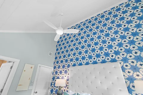 a bedroom with a bed and a shower