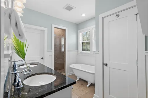 a bathroom with a sink and a bathtub