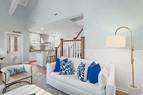 a living room with furniture or kitchen view and a kitchen view