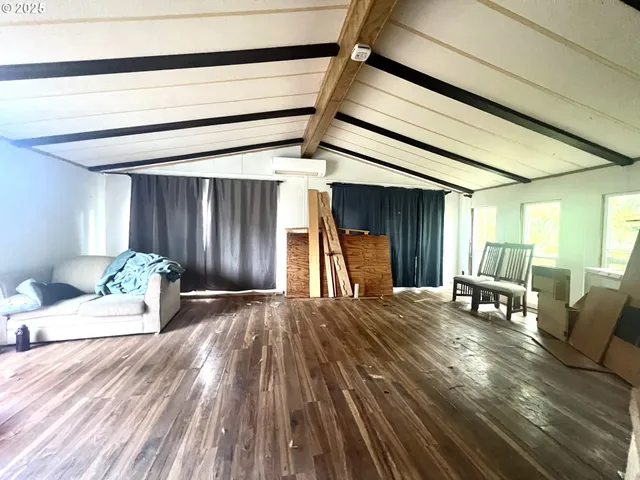 en empty room with windows