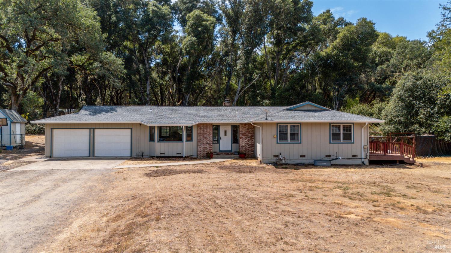 9510 West Potter Valley Road Potter Valley, CA 95469 - Photo 25 of 30 a front view of a house with a yard