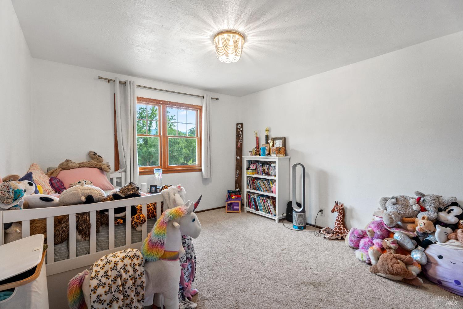 9510 West Potter Valley Road Potter Valley, CA 95469 - Photo 6 of 30 a bedroom with furniture and a window