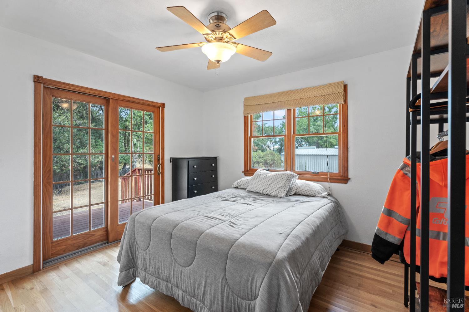 9510 West Potter Valley Road Potter Valley, CA 95469 - Photo 7 of 30 a bedroom with a bed and a large window