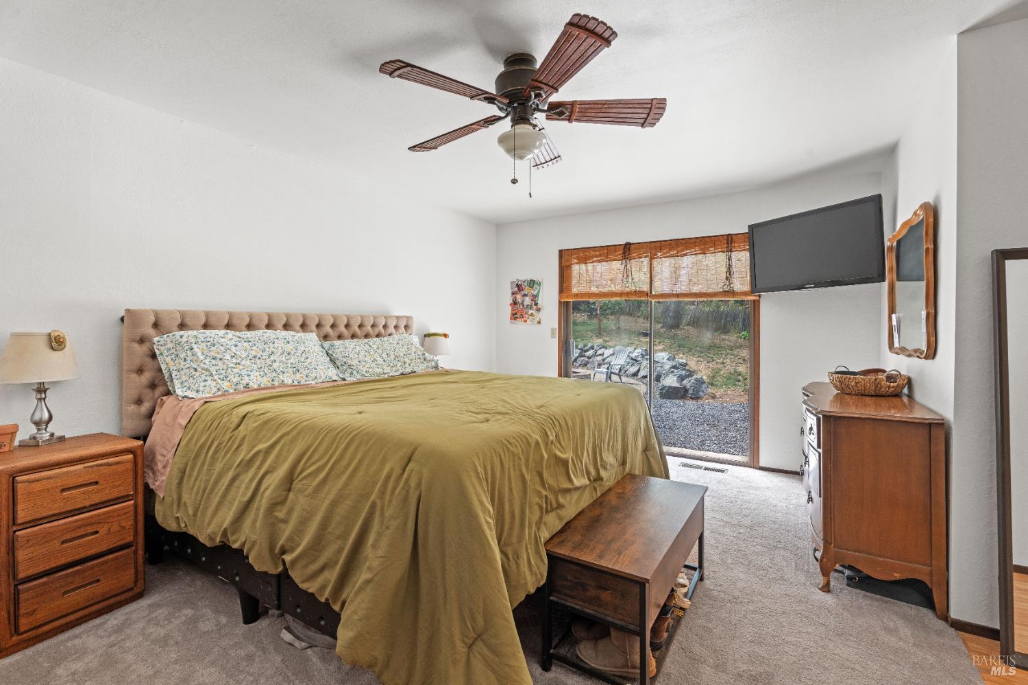 9510 West Potter Valley Road Potter Valley, CA 95469 - Photo 9 of 30 a bedroom with a bed and window
