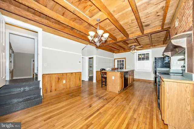 a bathroom with a toilet a sink and a shower