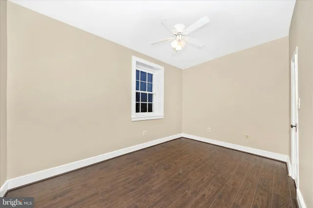 a view of a living room with a large window