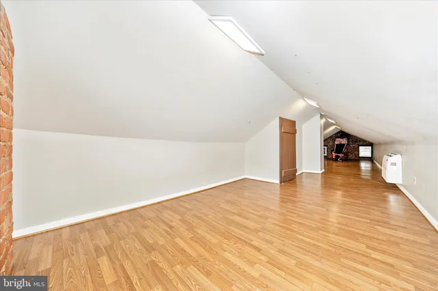 a view of an empty room with stairs