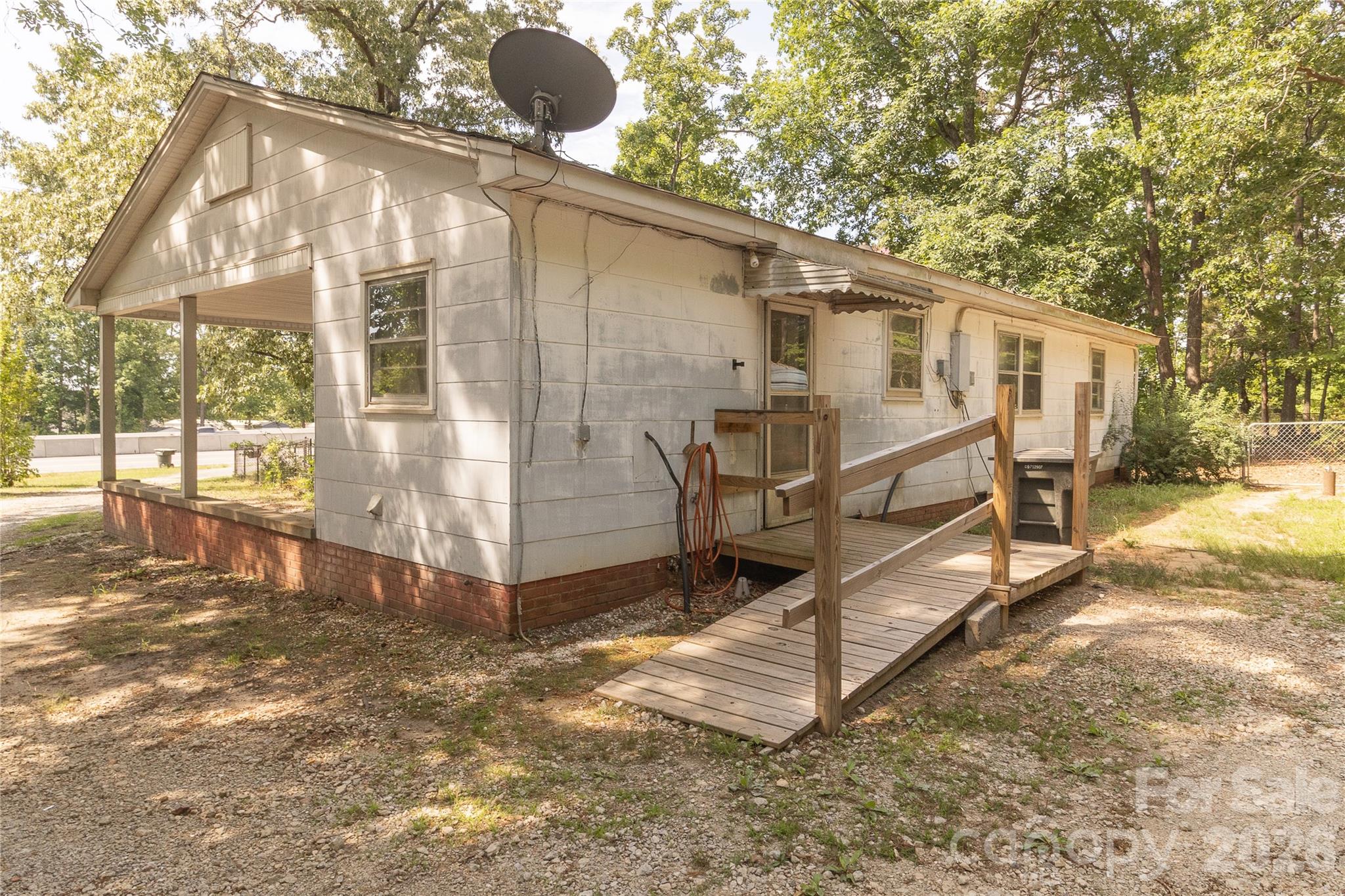 609 Wilcox Avenue Gaffney, SC 29341 - Photo 6 of 23 a view of a house with a yard