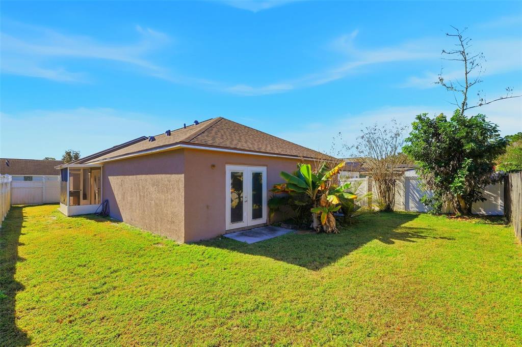 10517 Rocking A Run Orlando, FL 32825 - Photo 5 of 29 a view of a house with a big yard