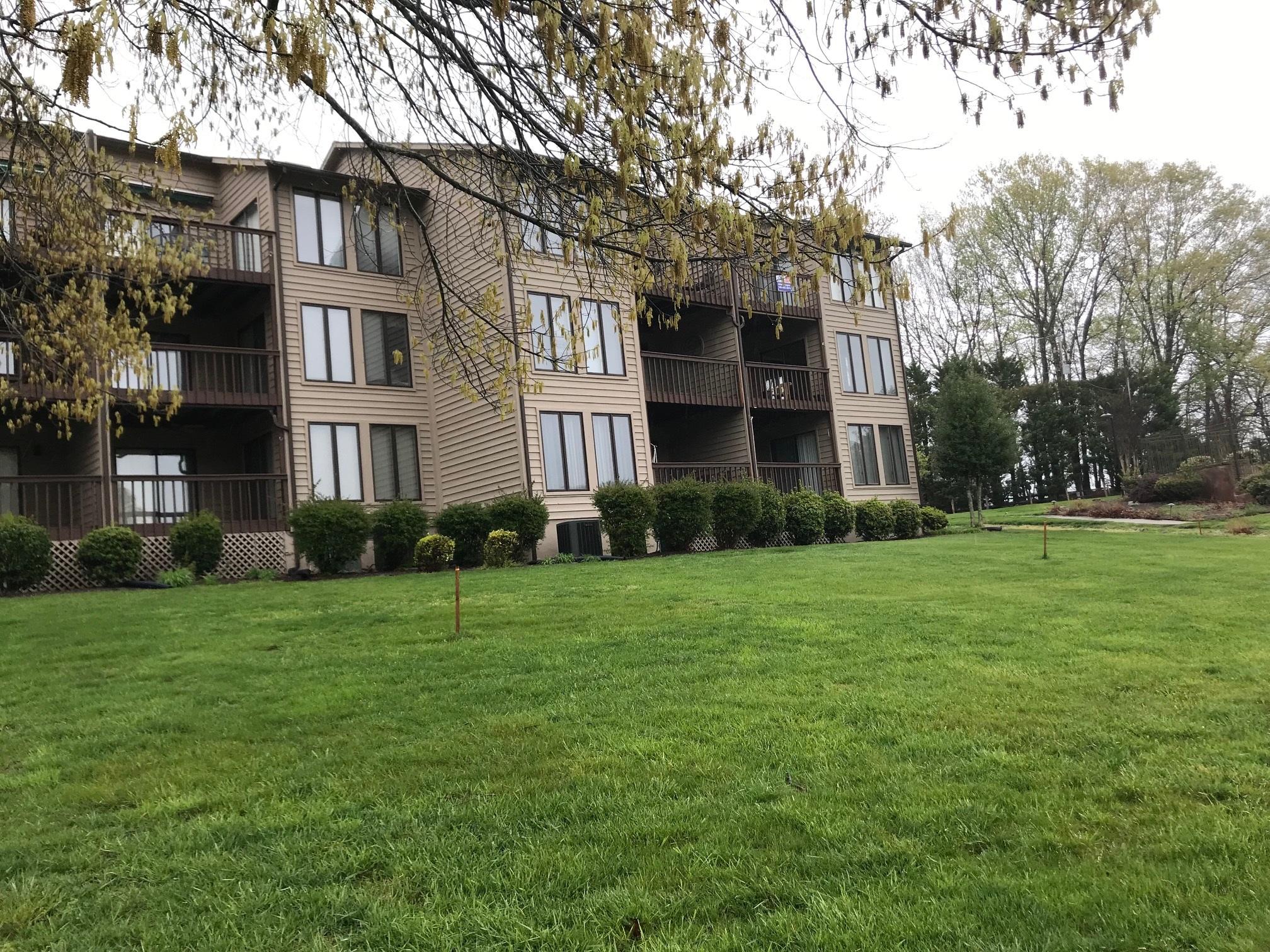 630 Monte Vista Road, Unit 502 Union Hall, VA 24176 - Photo 32 of 33 a front view of a building and trees