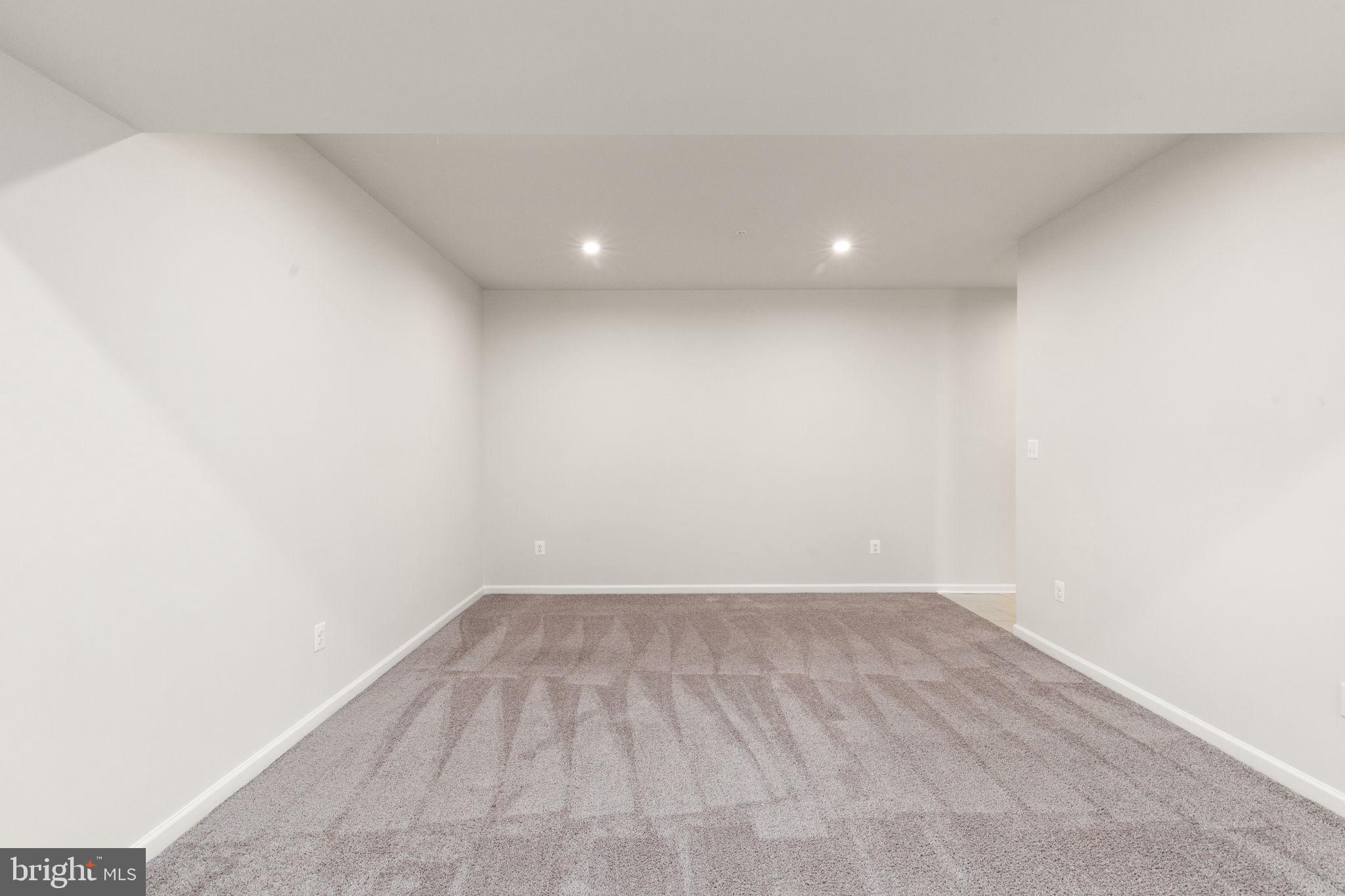 8333 Kippis Road Millersville, MD 21108 - Photo 26 of 40 Lower Level Recreation Room w/garage access