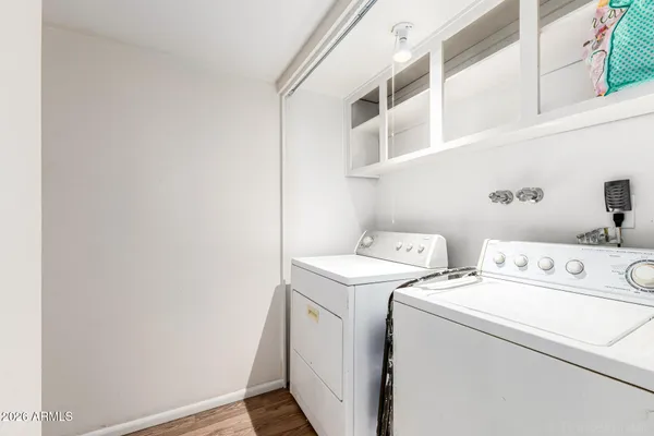 a utility room with dryer and washer
