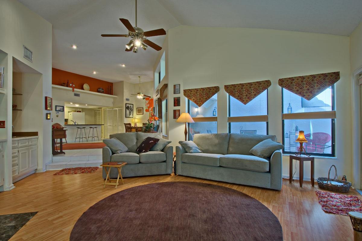 23315 Water Circle Boca Raton, FL 33486 - Photo 8 of 28 Living Room w/ Wet Bar & Fireplace
