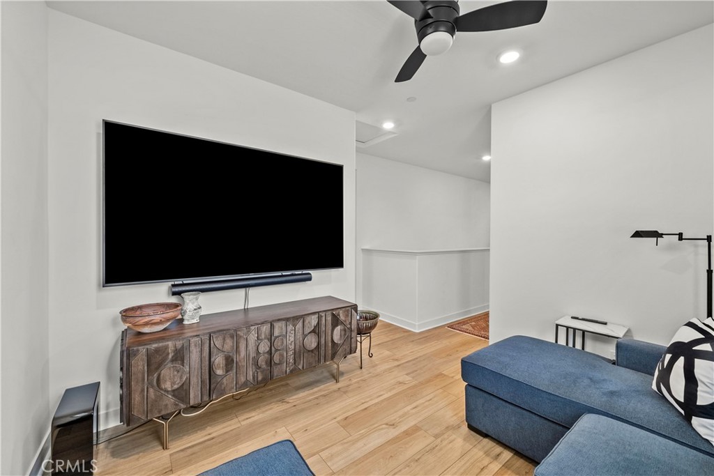 1663 Rosewell Road West Covina, CA 91791 - Photo 26 of 45 a living room with furniture and a flat screen tv
