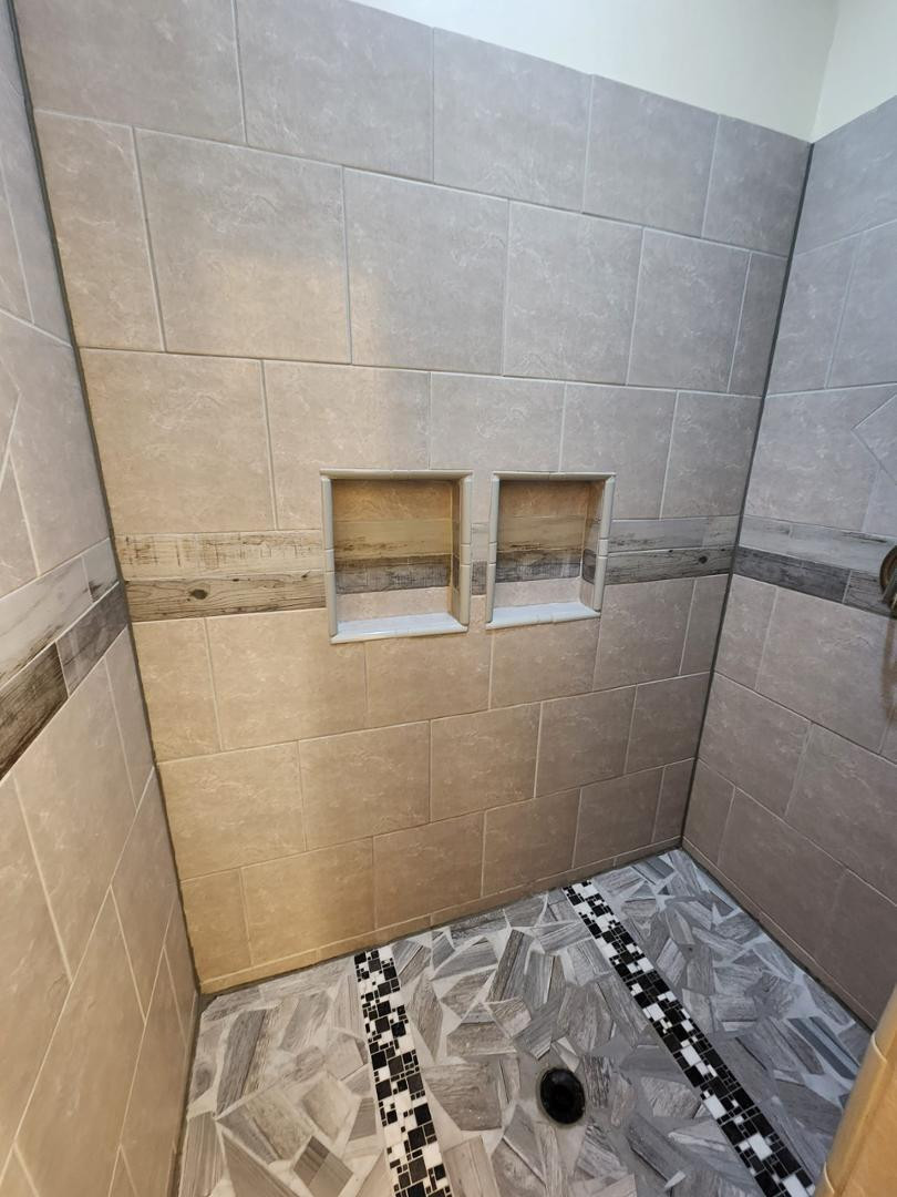 3641 Camino Del Rancho Douglas, AZ 85607 - Photo 17 of 20 a bathroom with a sink and a shower