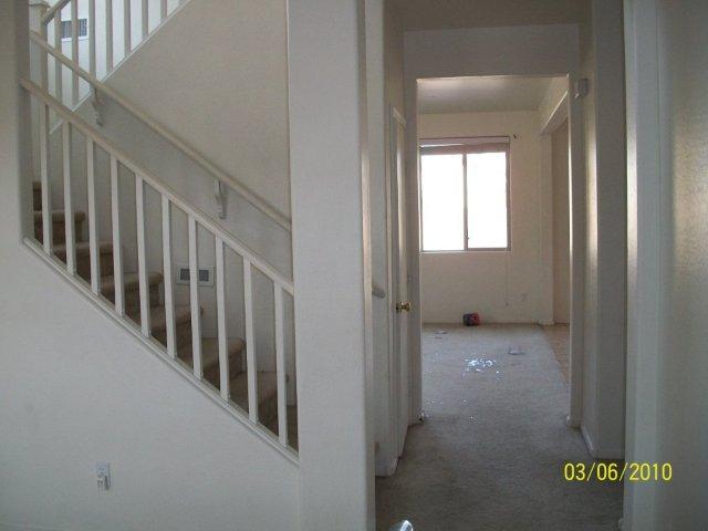 7312 West Maldonado Road Laveen, AZ 85339 - Photo 7 of 22 hall stairway