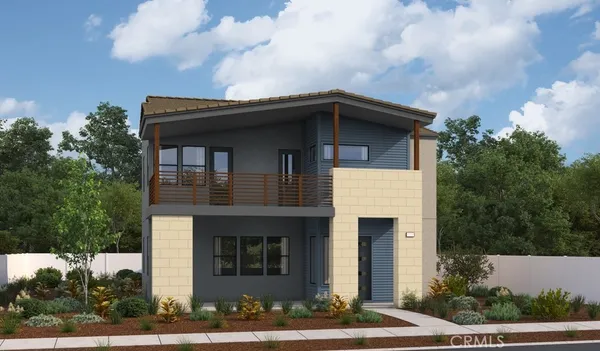 a house that has a tree in front of it