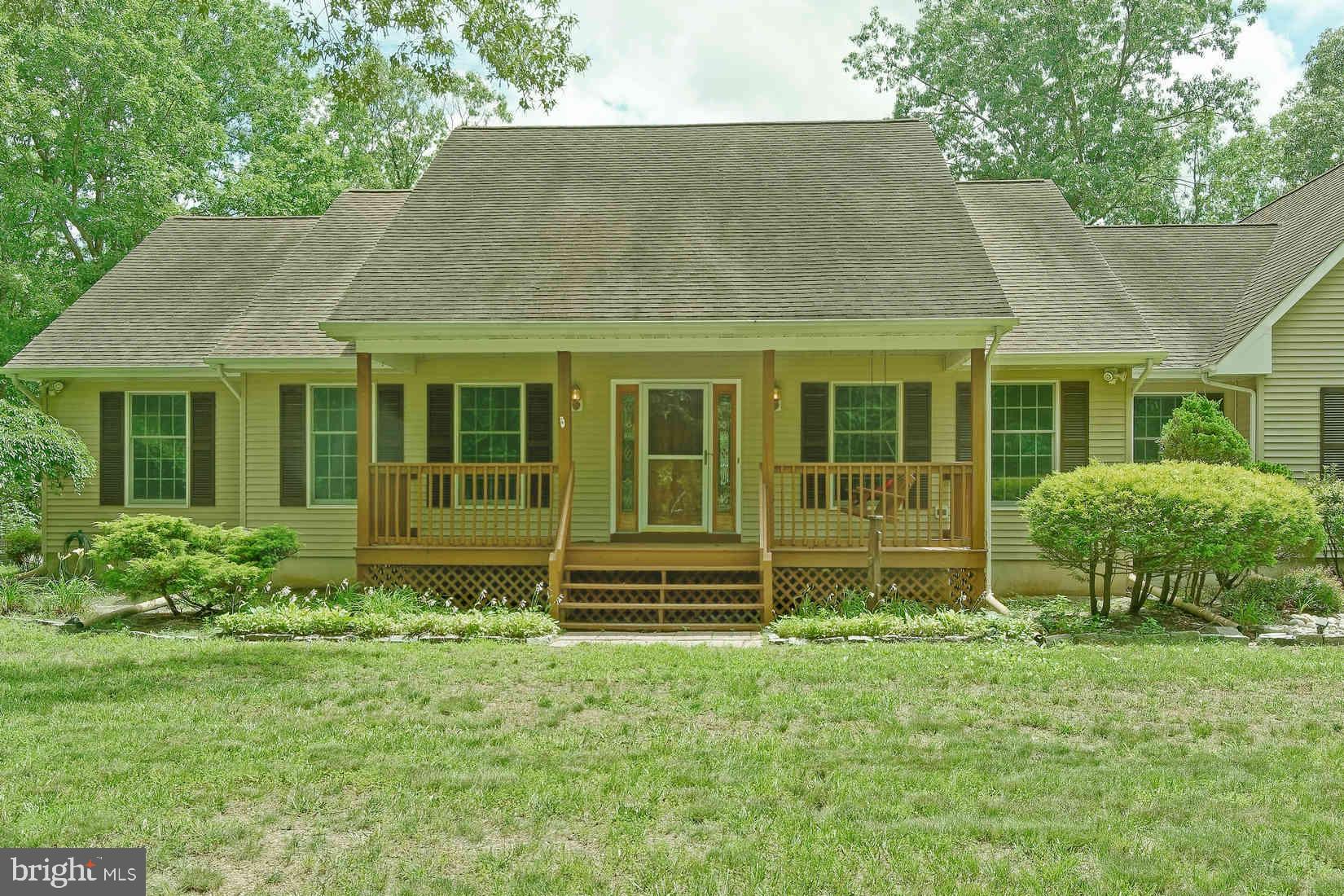 2801 Leaming Mill Road Millville, NJ 08332 - Photo 32 of 34 front view of a house with a yard