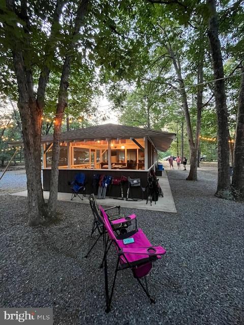 2801 Leaming Mill Road Millville, NJ 08332 - Photo 33 of 34 a view of a wooden deck with chairs and a yard