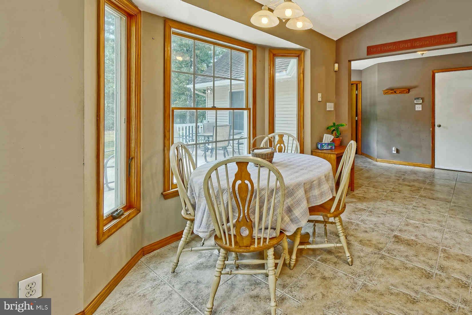 2801 Leaming Mill Road Millville, NJ 08332 - Photo 7 of 34 a dining room with furniture and window