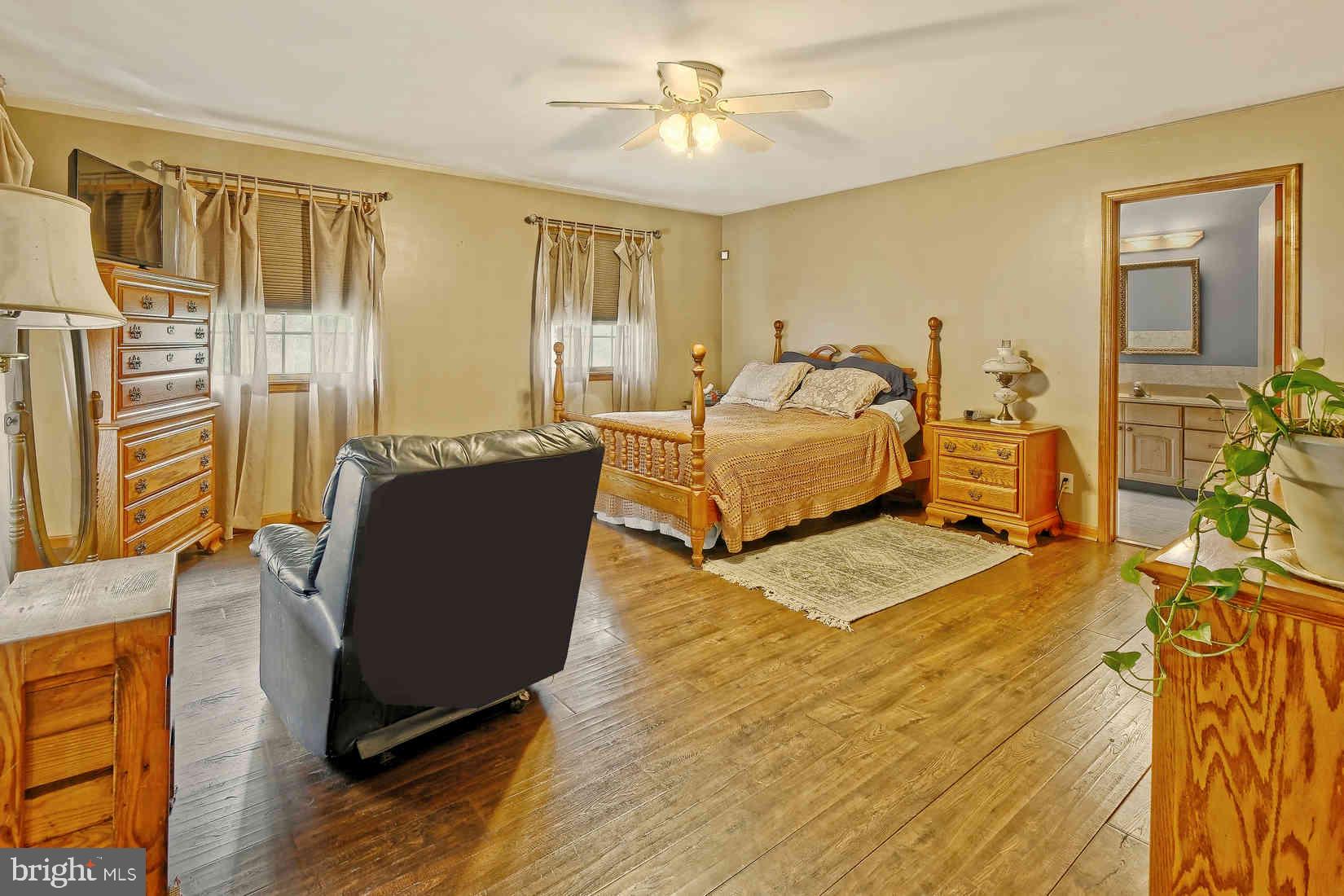 2801 Leaming Mill Road Millville, NJ 08332 - Photo 9 of 34 a bedroom with furniture and wooden floor