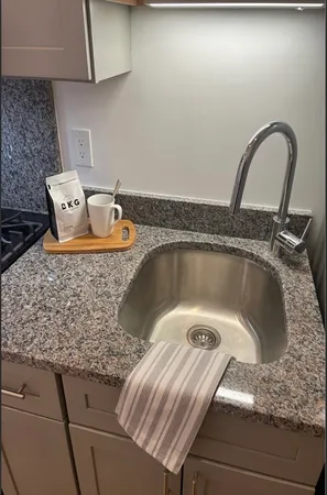 a room with a table and windows