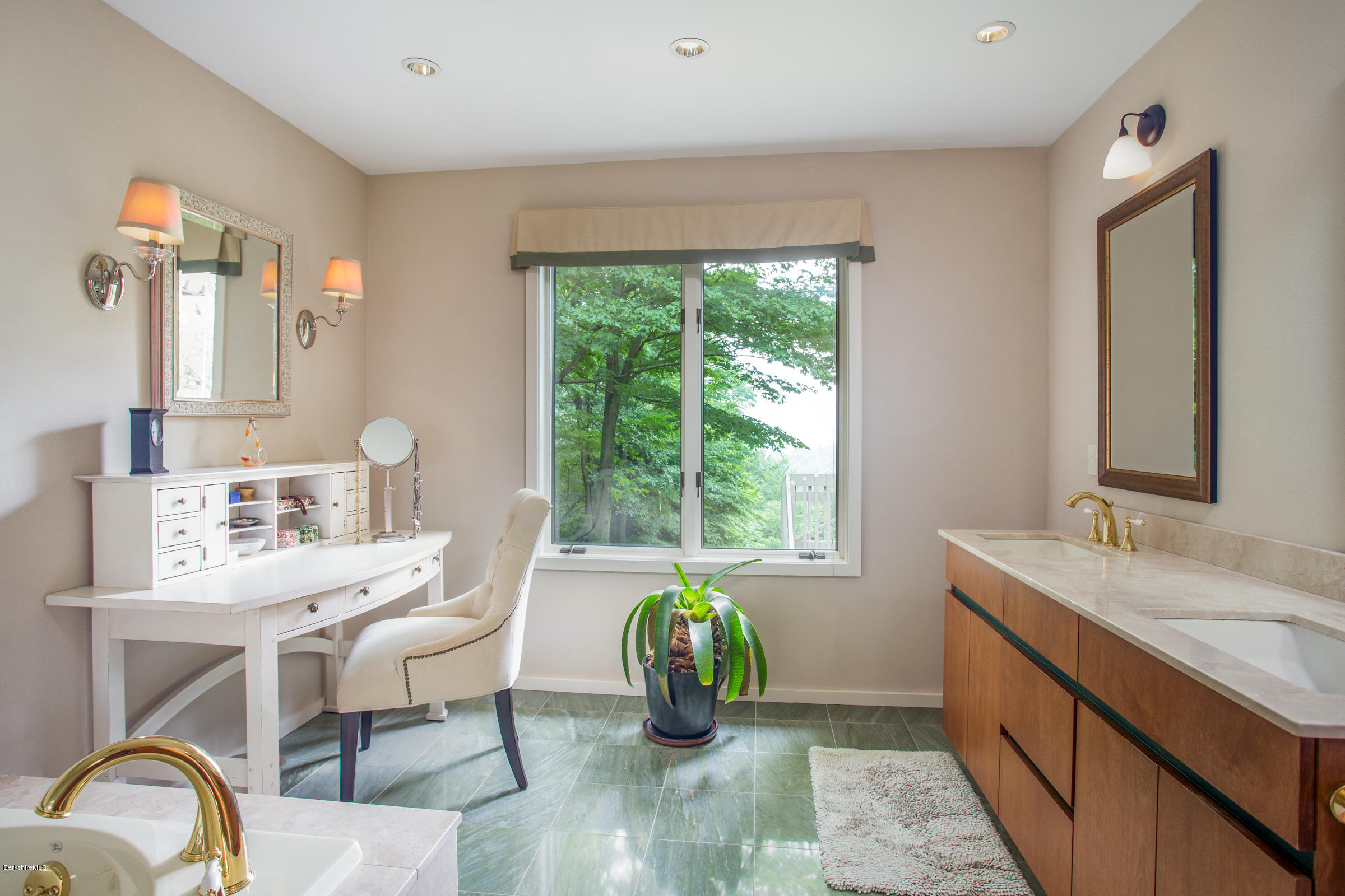 611 Main Road Monterey, MA 01245 - Photo 12 of 32 a kitchen with dining table chairs and window