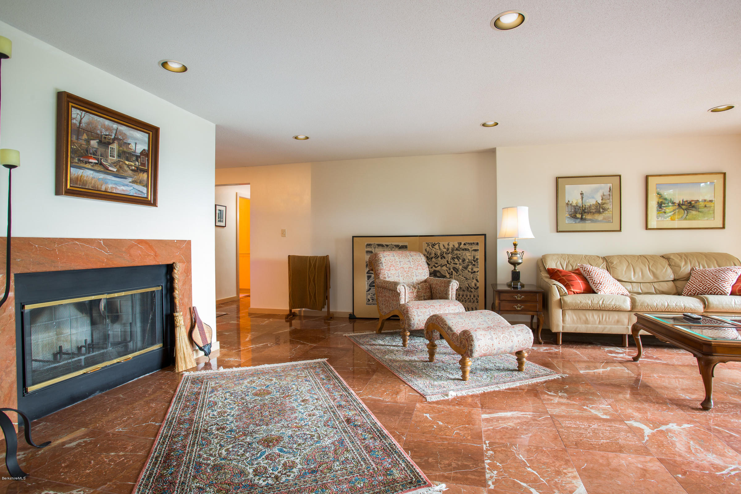 611 Main Road Monterey, MA 01245 - Photo 14 of 32 a living room with furniture and a fireplace