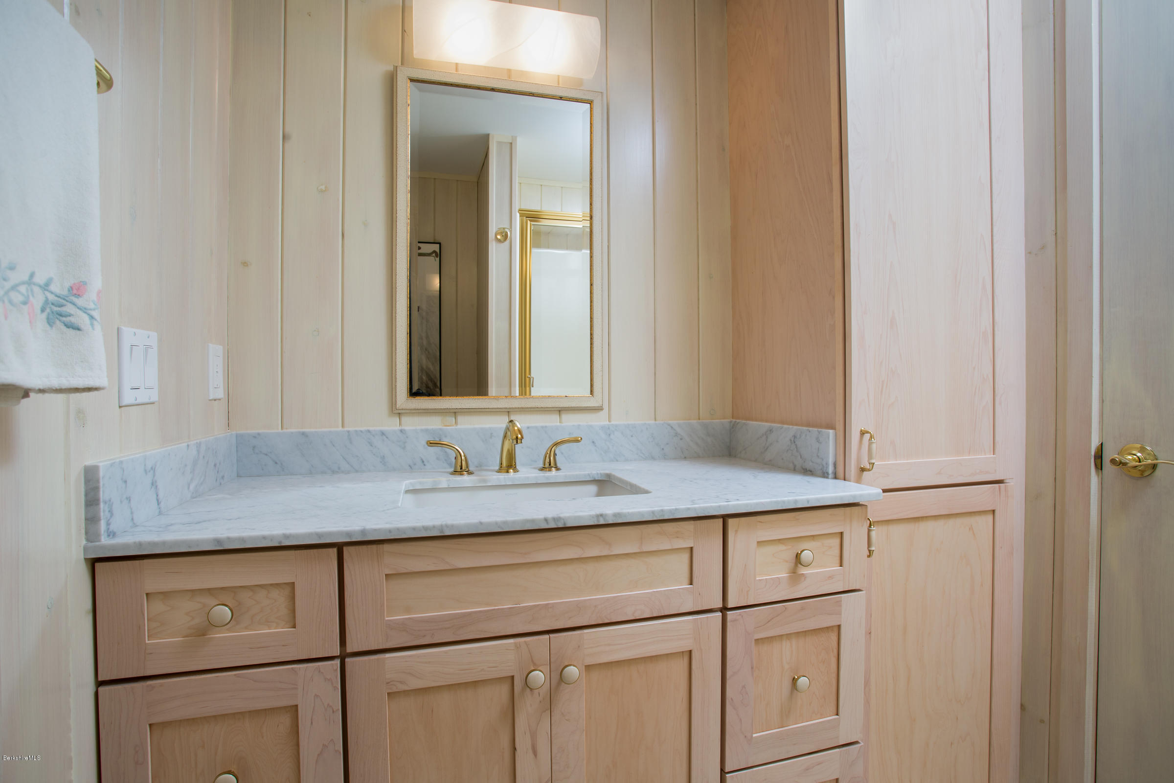 611 Main Road Monterey, MA 01245 - Photo 17 of 32 a bathroom with a sink and vanity