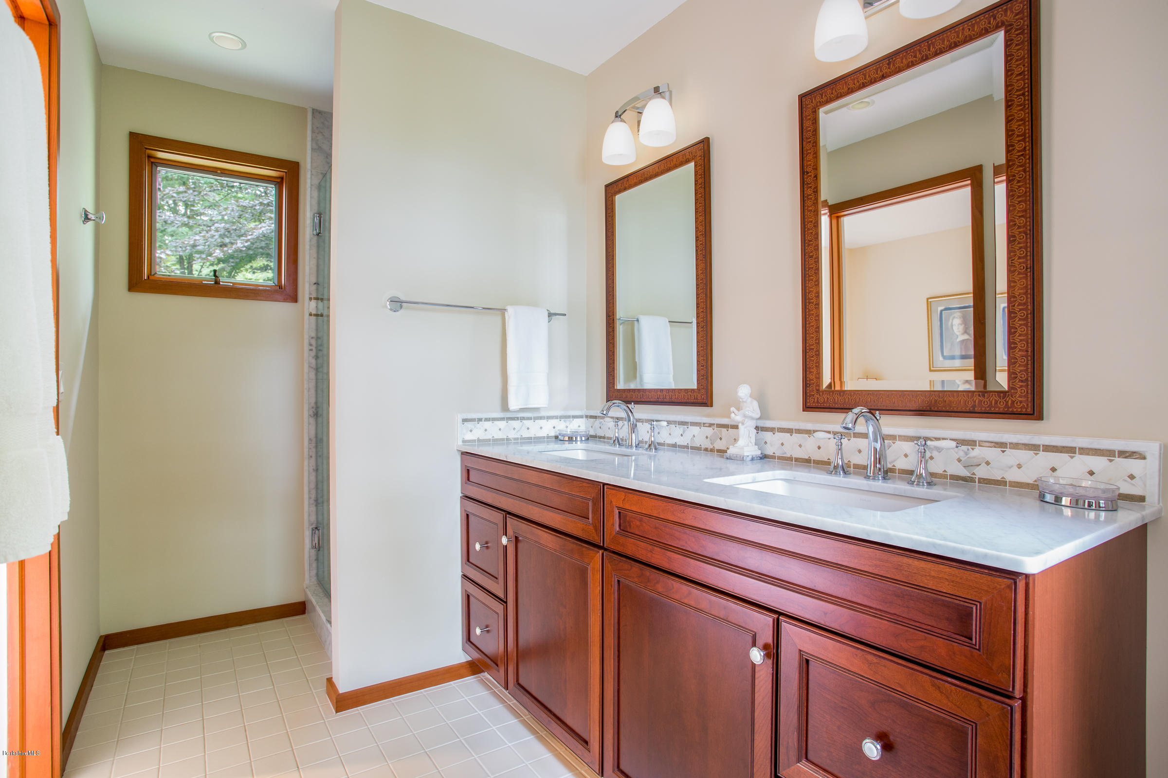611 Main Road Monterey, MA 01245 - Photo 24 of 32 a bathroom with a sink and a mirror