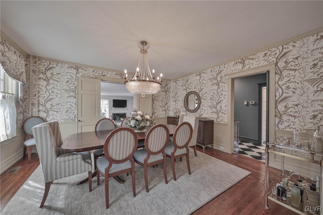 837 Tioga Avenue Bethlehem, PA 18018 - Photo 14 of 50 a view of a dining room with furniture and a chandelier