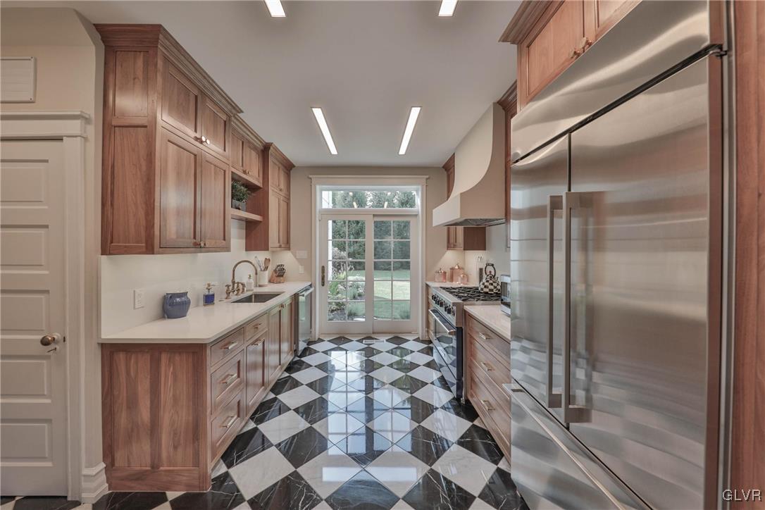 837 Tioga Avenue Bethlehem, PA 18018 - Photo 24 of 50 a kitchen with sink cabinets and stainless steel appliances